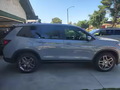 Silver SUV with tinted windows